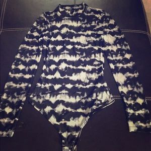 Long sleeved bodysuit by Haute Monde